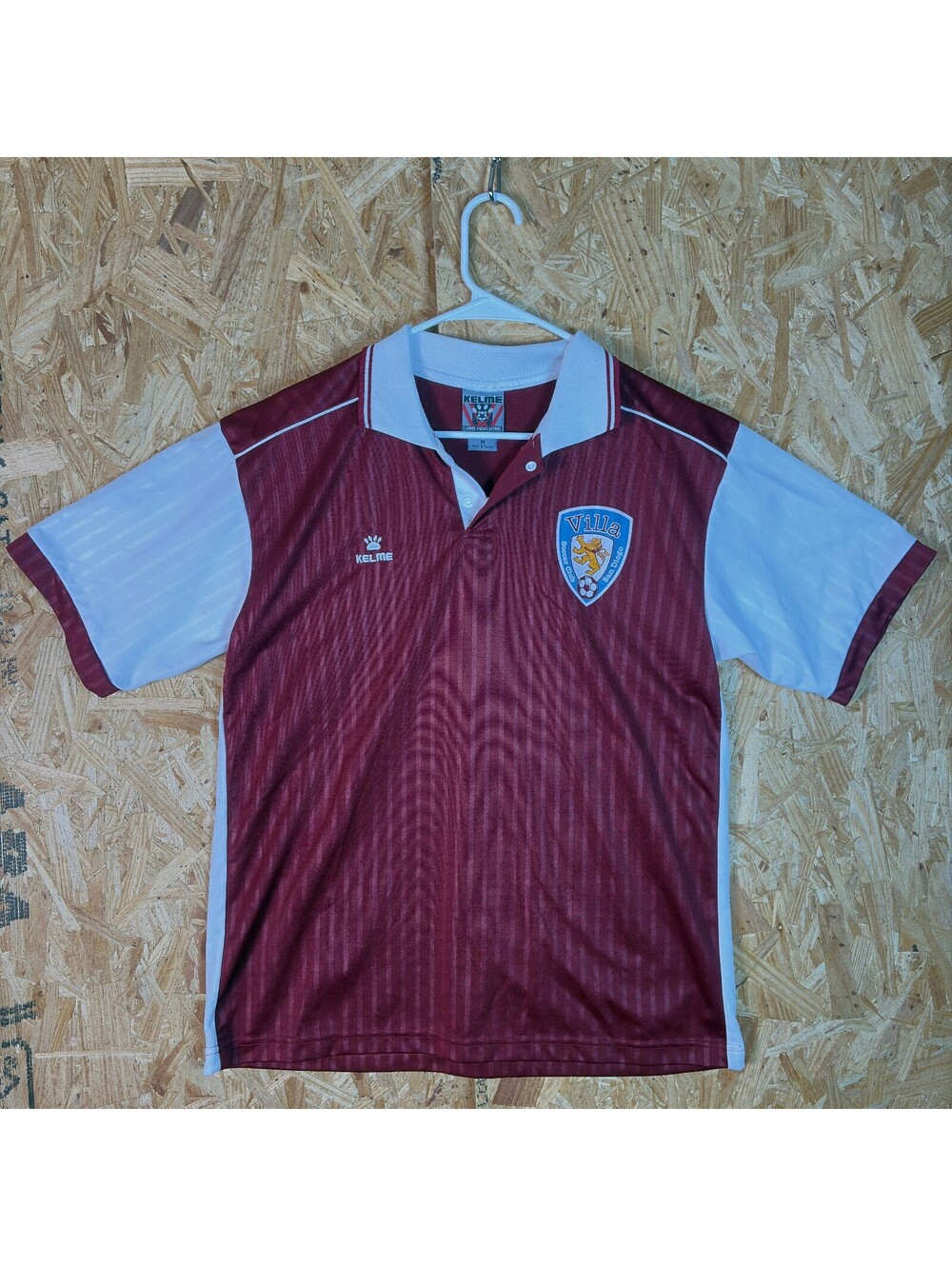 Kelme Villa maroon soccer jersey